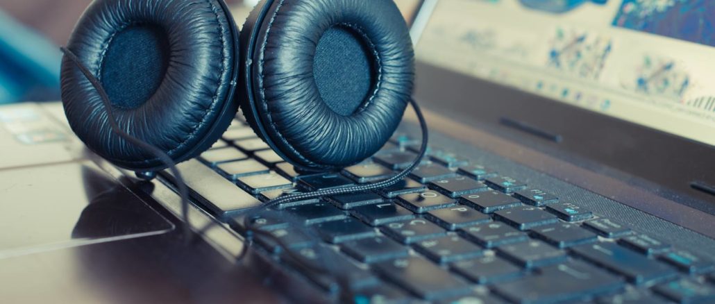 headphones on notebook